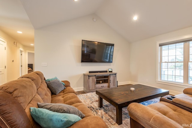 living room featuring baseboards, vaulted ceiling, wood finished floors, and recessed lighting