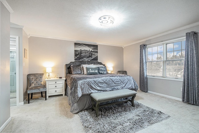 bedroom with crown molding, a textured ceiling, and light colored carpet