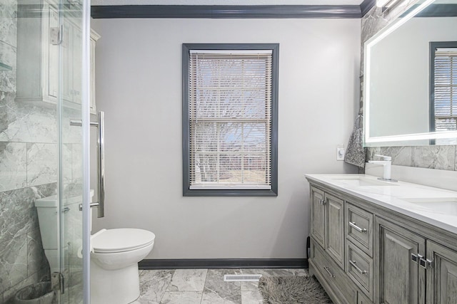 full bathroom with a sink, visible vents, marble finish floor, double vanity, and a stall shower