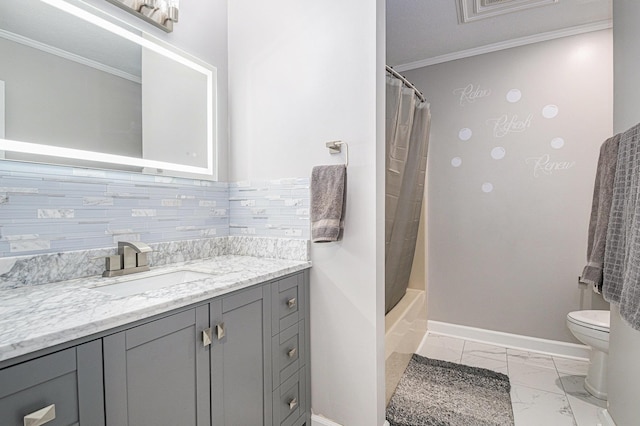 bathroom featuring baseboards, toilet, ornamental molding, marble finish floor, and vanity