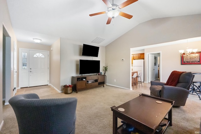 living room with lofted ceiling, ceiling fan with notable chandelier, baseboards, and light colored carpet