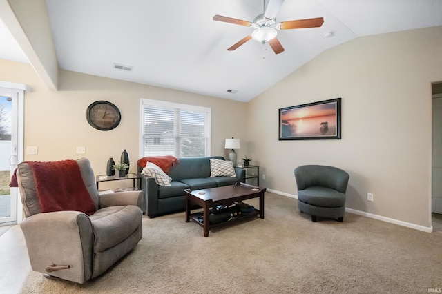 living area with baseboards, visible vents, lofted ceiling, ceiling fan, and carpet floors