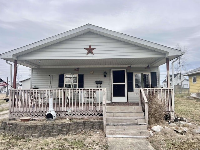 view of front of property featuring covered porch