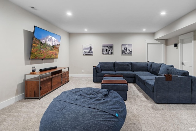 living area featuring carpet, visible vents, baseboards, and recessed lighting