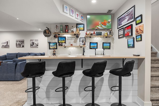 bar featuring stairs, wet bar, visible vents, and recessed lighting