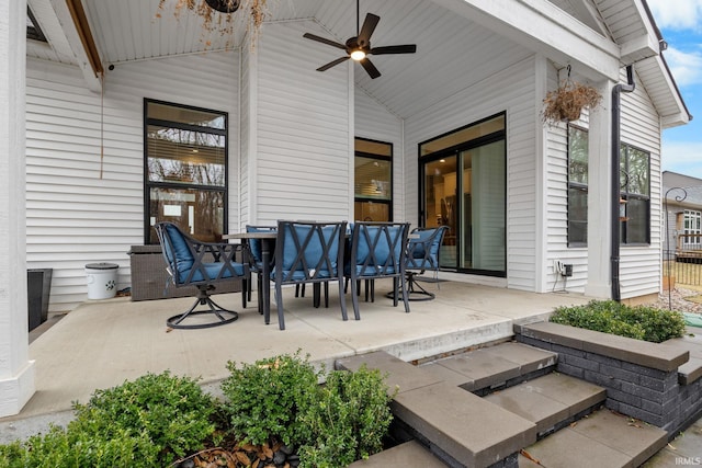 view of patio with ceiling fan and outdoor dining area