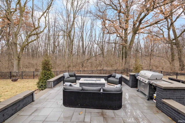 view of patio / terrace featuring outdoor lounge area, a fenced backyard, and area for grilling