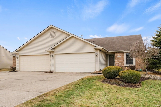 ranch-style house with driveway, brick siding, and an attached garage