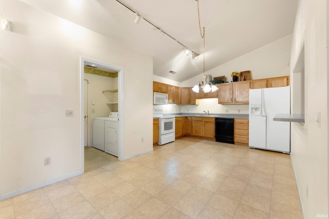 kitchen featuring light floors, lofted ceiling, a sink, white appliances, and independent washer and dryer