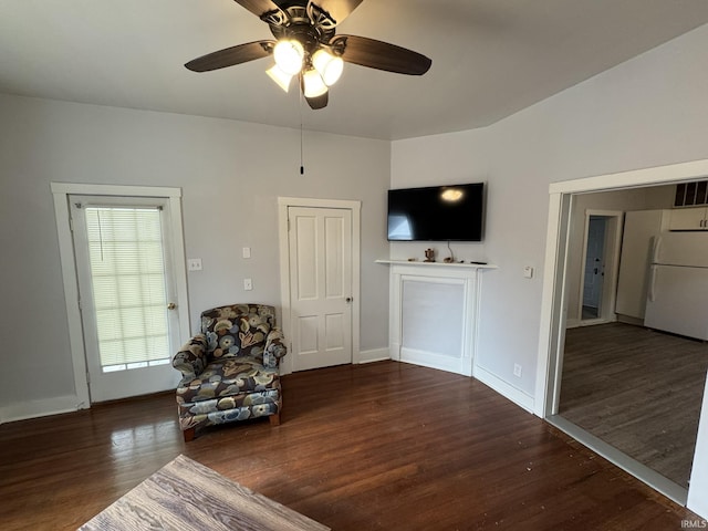 unfurnished room with a ceiling fan, baseboards, visible vents, and wood finished floors