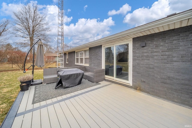 wooden terrace featuring area for grilling