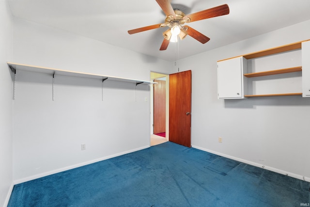 unfurnished bedroom with carpet floors, baseboards, and a ceiling fan