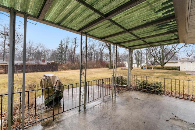 view of patio / terrace featuring fence