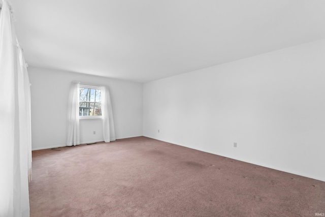 empty room with carpet floors