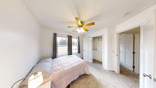 bedroom featuring baseboards, a closet, a ceiling fan, and light colored carpet