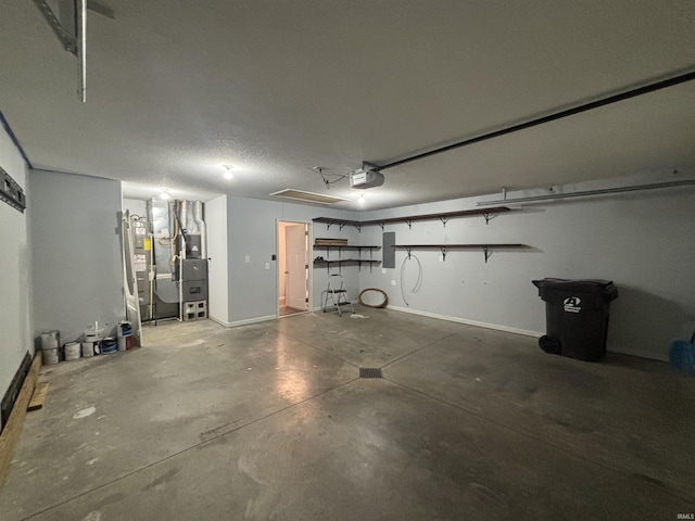 garage with water heater, electric panel, and baseboards