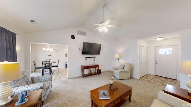 living room with lofted ceiling, ceiling fan with notable chandelier, carpet, and visible vents