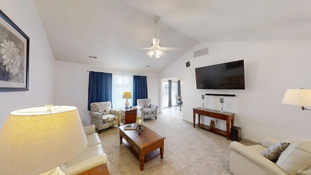 living room featuring lofted ceiling, visible vents, ceiling fan, and light carpet