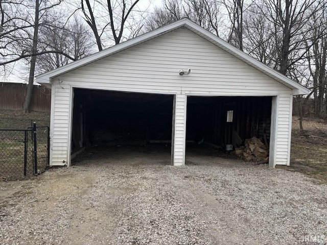 detached garage with fence