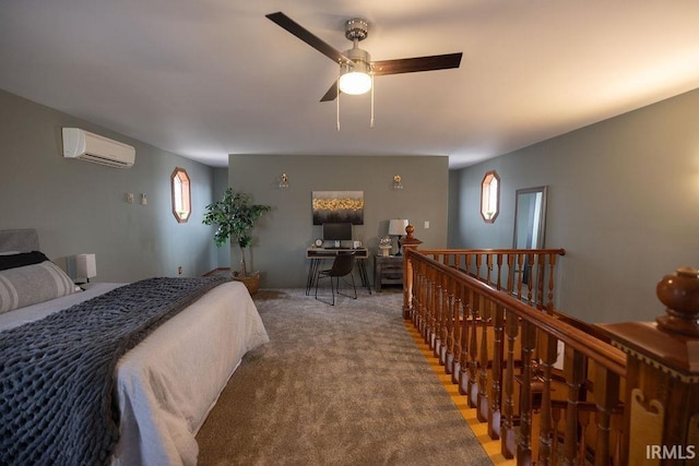 bedroom featuring a wall unit AC and carpet flooring