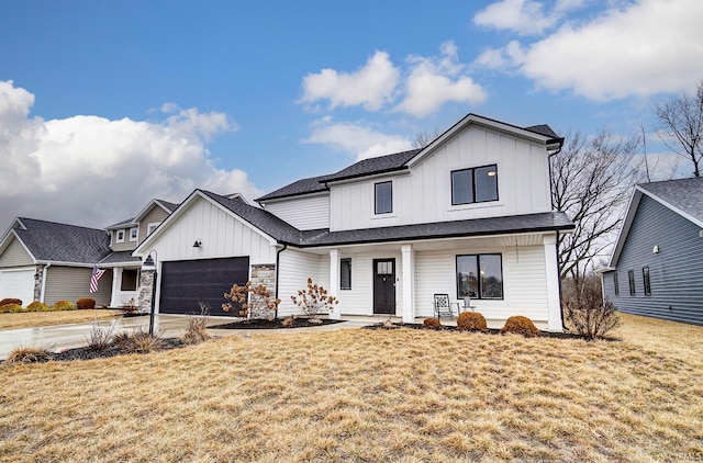 modern farmhouse with board and batten siding, driveway, a garage, and a porch