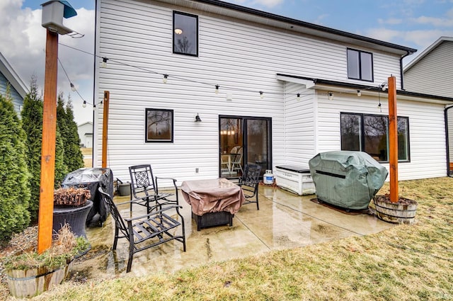 back of property featuring a patio area