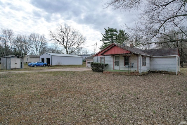 view of front of home with an outbuilding