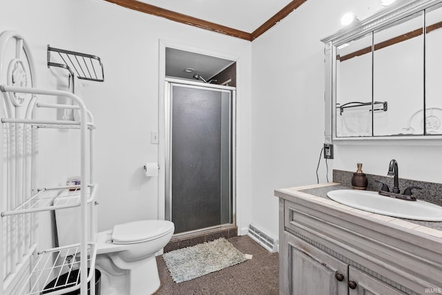 full bath featuring baseboards, toilet, crown molding, vanity, and a shower stall