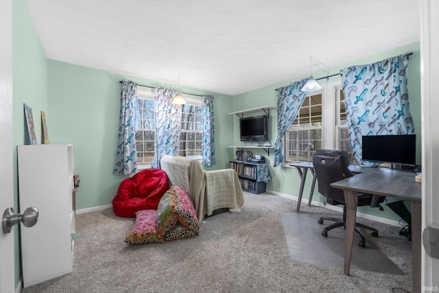 home office with carpet floors and baseboards