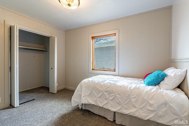 bedroom featuring a closet and carpet flooring