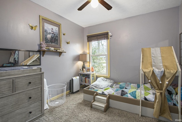 bedroom with carpet and a ceiling fan