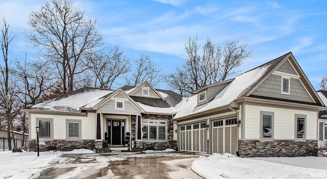 view of front of home with stone siding