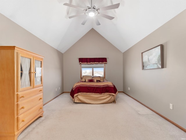 bedroom with light carpet, ceiling fan, vaulted ceiling, and baseboards