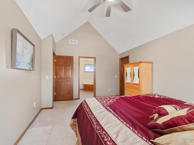 bedroom featuring visible vents, ensuite bathroom, light carpet, high vaulted ceiling, and baseboards