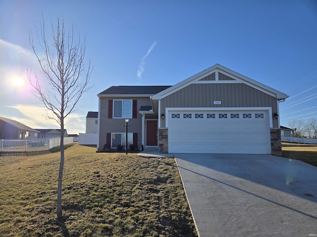 view of front of property with a garage, concrete driveway, stone siding, fence, and board and batten siding