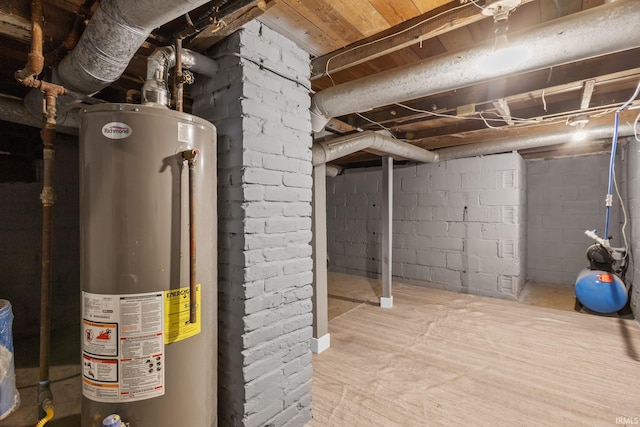 unfinished basement featuring water heater