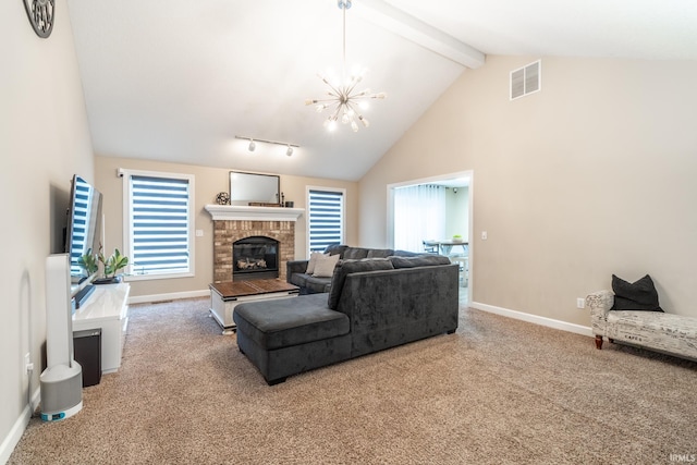 living room featuring a brick fireplace, beam ceiling, visible vents, and carpet flooring