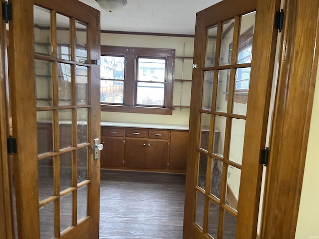 interior space with french doors and wood finished floors