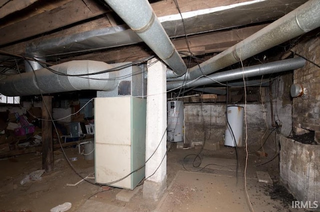 below grade area featuring crawl space, water heater, and gas water heater