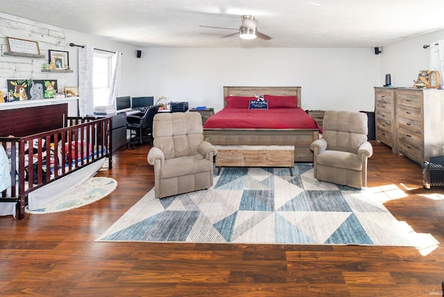 bedroom featuring ceiling fan and wood finished floors