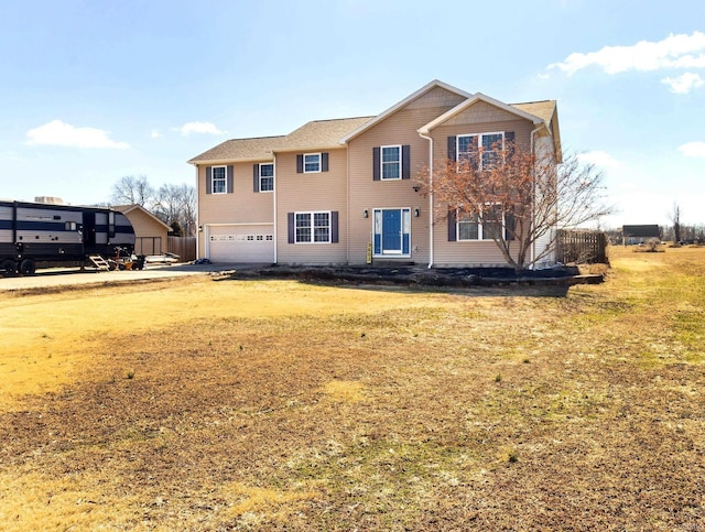 view of front of property featuring a garage