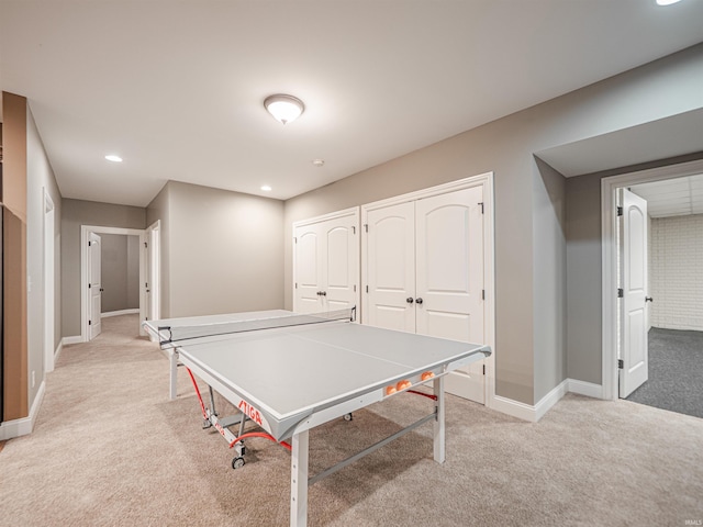 playroom with baseboards, recessed lighting, and light colored carpet