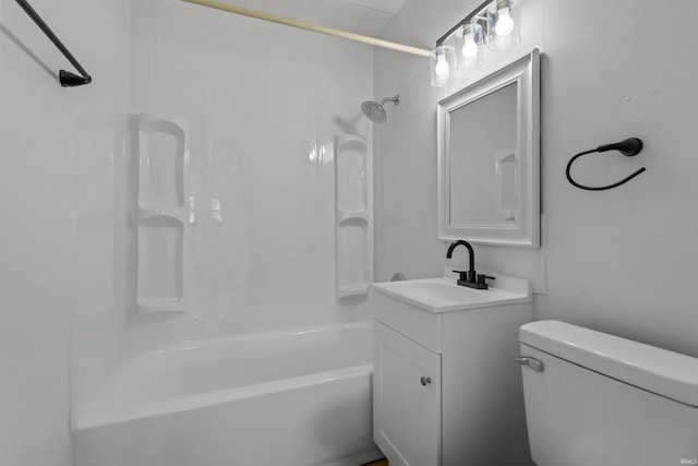 bathroom with  shower combination, vanity, and toilet