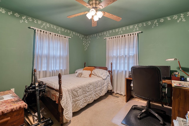 bedroom with carpet and a ceiling fan