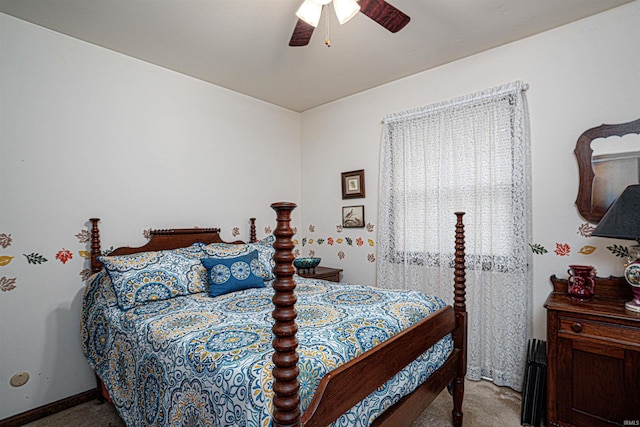 carpeted bedroom with a ceiling fan