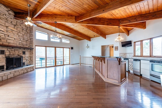 kitchen featuring a chandelier, open floor plan, and stainless steel appliances