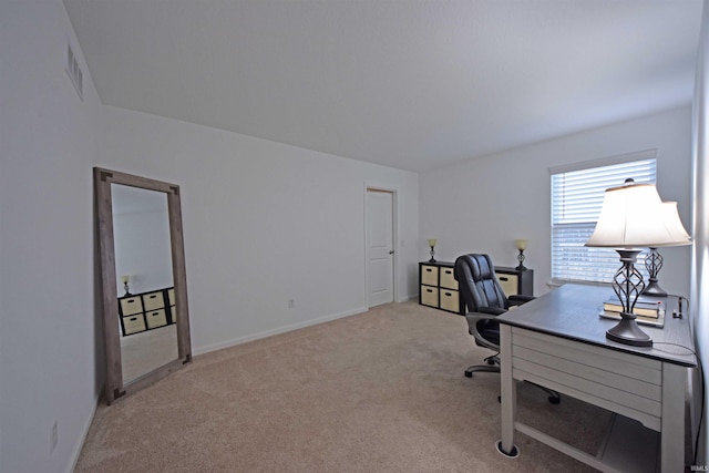 office with carpet floors and baseboards