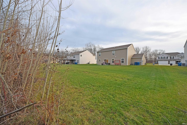 view of yard featuring a residential view