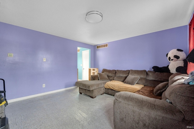 living room featuring visible vents and baseboards