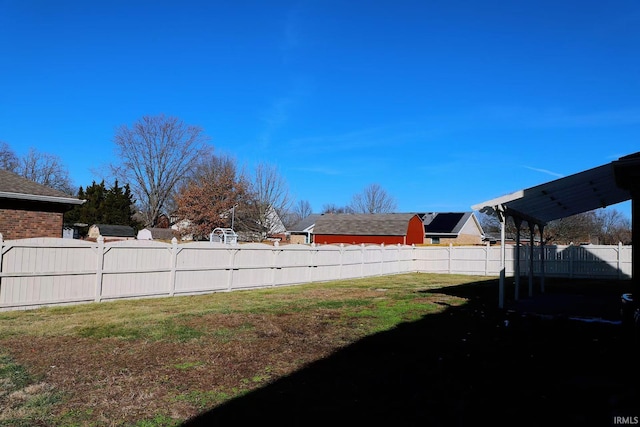 view of yard with fence